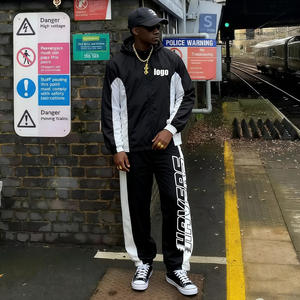 Conjunto de chaqueta cortavientos con logotipo bordado de nailon personalizado Chándales ligeros a prueba de viento de retazos - Product Image 1