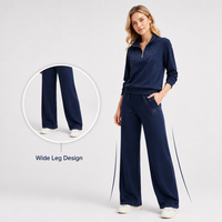 Ensemble décontracté deux pièces pour femme, bleu marine, broderie florale, coupe ample, avec fermeture éclair, manches longues, en coton aéré, pantalon large