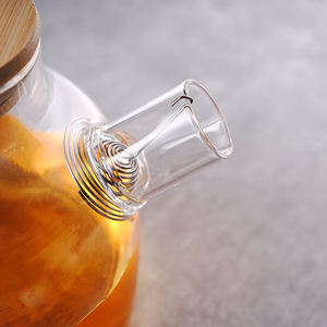 Venta al <span class=keywords><strong>por</strong></span> <span class=keywords><strong>mayor</strong></span> 1000ml 1800ml Tetera <span class=keywords><strong>de</strong></span> vidrio transparente <span class=keywords><strong>de</strong></span> borosilicato resistente al calor - Product Image 6