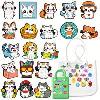 Décorations personnalisables de chaussures de chat de dessin animé mignon de concepteur PVC différentes couleurs en gros décorations de chaussures de chat pour les amoureux des animaux de compagnie