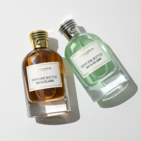 Vente en gros de flacons de parfum vides de 100 ml, rechargeables, étanches, avec un motif unique sur le bouchon, flacon en verre personnalisé avec boîte cadeau