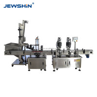 Machine de capsulage automatique haute vitesse avec système servo et élévateur d'alimentation des bouchons pour l'emballage