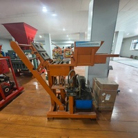 Petite machine manuelle de fabrication de blocs de ciment creux 220V avec moteur et composants essentiels