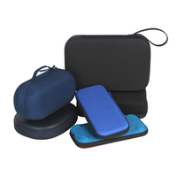 Estuche Protector de EVA OEM ODM con Ribete en Contraste Negro y Rojo, Organizador con Bolsillo Externo con Cremallera, Asa de Transporte y Correa para la Muñeca