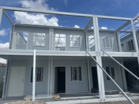Maison conteneur modulaire empilable et démontable pour bureau, hôtel, toilettes extérieures, avec design moderne et garantie d'un an