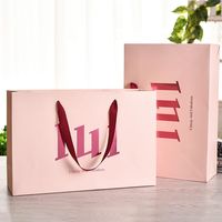 Sacs en papier cartonné personnalisés de haute qualité, sacs cadeaux roses pour vêtements et sous-vêtements, pour les petites entreprises, avec poignée en ruban
