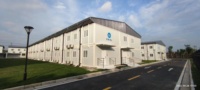 Bâtiment préfabriqué de structure en acier de maison de conteneur de paquet plat de 20 pieds pour le développement immobilier rapide-pour l'école de bureau