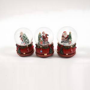 Boîte à musique boule de neige avec thème de Noël, diamètre 10 cm, hauteur 14 cm, assortiment. - Product Image 1