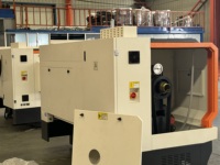 Petit tour CNC horizontal 750 mm à banc plat pour l'usinage des métaux en atelier