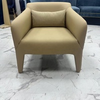 Fauteuil convertible de loisirs entièrement recouvert de cuir avec coussin pour salon, appartement et hôtel
