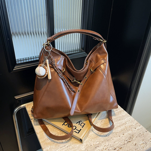 Bolso tote retro de gran capacidad, nuevo estilo 2026, bolso de hombro/<span class=keywords><strong>mochila</strong></span> retro de alta calidad y textura. - Product Image 1