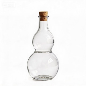 Bottiglia in Vetro Trasparente <span class=keywords><strong>a</strong></span> Forma di <span class=keywords><strong>Zucca</strong></span> da 750ml, Personalizzabile con Incisione, Superficie Satinata, per Fragranze, Profumi, Liquori, Confezione Regalo Artigianale con Tappo in Sughero - Product Image 1