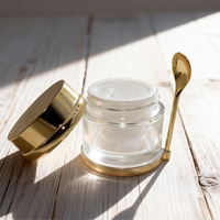 Vente en gros d'usine, pots de crème pour le visage en or rose et argent avec cuillère plate, 30g 50g 80g, ensemble d'emballage pour soins de la peau, pot en verre