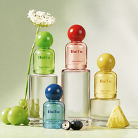 Bouteilles de parfum vides en verre coloré de luxe HuiYu, cylindriques, violettes, roses, vertes, 30 ml, avec pulvérisateur à pompe à col serti et estampage doré, en gros
