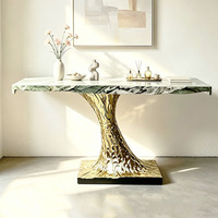 Table console moderne de luxe extensible en marbre et métal avec base en tronc d'arbre doré pour salle à manger et salon