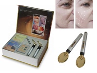 Outil de drainage lymphatique Golden Spoon, masseur oculaire chauffant à microcourant et vibrations, pour les cernes et les rides.