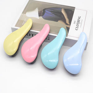 Brosse de toilettage démêlante pour animaux de compagnie, à picots en nylon doux, pour chiens et chats - Product Image 1