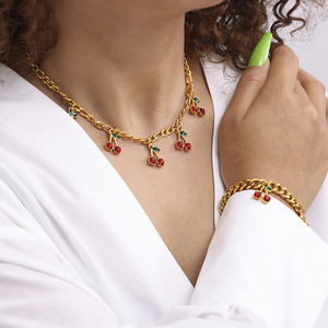 PUXIN Hot Selling PVD Gold Plated Stainless Steel <b>Glass</b> Stones Cherry Pendants Thick Chain Necklace Bracelets <b>Charms</b> Jewelry - Product Image 2