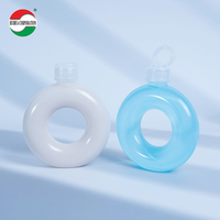 Nouvelle conception, bouteille de boisson en plastique PP de 500 ml en forme de beignet, logo personnalisé pour le thé, la bière gazeuse, le whisky, le jus, le lait, le café avec anneau de traction
