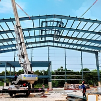 Structure de maison modulaire en métal Q235b personnalisée, structure en acier, kit de construction d'entrepôt