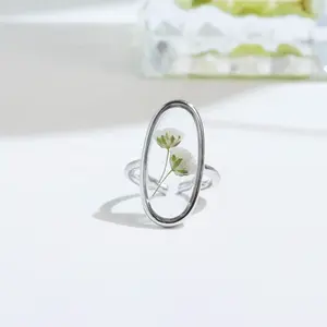 Vente en gros prix usine classique fleur bijoux argent 925 or véritable fleur elliptique résine anneaux