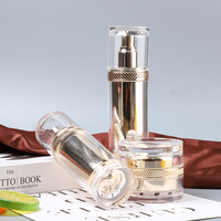 Vente en gros d'usine, flacon cosmétique de luxe en acrylique rond doré personnalisé