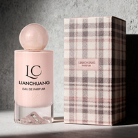 Flacon de parfum pour femmes en verre rose cylindrique de 100 ml, flacon de parfum à fond volcanique avec boîte cadeau personnalisée