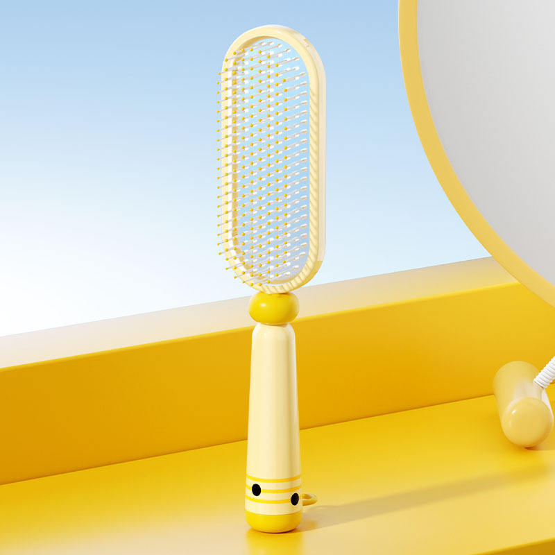 หวีดูดความชื้น [สีเหลืองพร้อมแปรงทำความสะอาด]