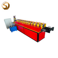 Machine de formage de rouleaux pour portes à enroulement à froid 82-121