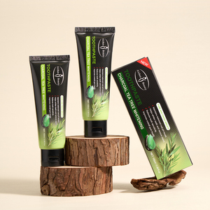 Prix de gros 100g Dentifrice blanchissant au <span class=keywords><strong>charbon</strong></span> et à l'arbre à thé Équilibre le pH buccal Haleine fraîche longue durée en vrac - Product Image 1
