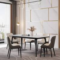 Table à manger en pierre frittée personnalisable de luxe léger avec pieds en forme d'éléphant, design rectangulaire moderne et simple pour petits appartements