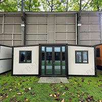Maison conteneur extensible imperméable à construction rapide FLKT, garantie 2 ans, usine source, maison préfabriquée moderne pliable avec cuisine