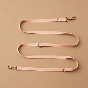 Venta al por mayor de lujo recubierto de PVC correa de perro de dos cabezas impermeable manos libres accesorio para mascotas con estilo Simple moderno duradero - Product Image 1