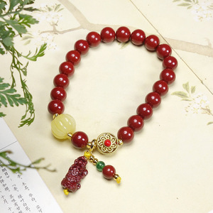 กำไลข้อมือจากแร่ซินนาบาร์ที่มีปริมาณสูง ทรายทองสีม่วง และขี้ผึ้ง พร้อมดีไซน์ปี่เซียะแบบเส้นเดี่ยวหรือหลายเส้น ที่เป็นเครื่องรางเสริมดวง - Product Image 2