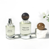 Boîte à parfum personnalisée de forme ronde à vendre, conteneur cosmétique, flacon d'huile corporelle 50 ml, flacon de parfum de luxe