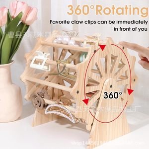 Creative wooden display rack with claw clips and hair accessories, 360-degree rotating Ferris wheel design. - Product Image 3