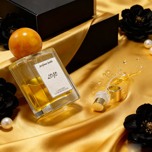 ขวดน้ำหอมแก้วใสทรงสี่เหลี่ยมสวยงามขนาด50/100มล. พร้อมฝาทรงกลมลวดลายหินอ่อนสีส้มเหลือง - Product Image 1