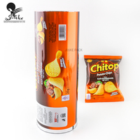 Film laminé PE PET rouleau de film plastique personnalisé bouffée de bonbon alimentaire banane croustilles rouleau de film d'emballage alimentaire pour emballage alimentaire