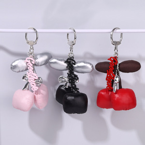 Ute cuir cerise pour femmes mode nœud papillon pendentif personnalisé sac breloque voiture porte-clés accessoire - Product Image 3