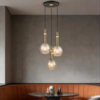 Suspension LED moderne à 3 lumières, design globe en verre empilé, finition bronze et noir, cordon réglable, pour table à manger, garantie 2 ans
