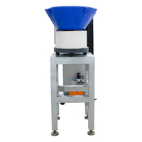 Machine automatique de poinçonnage et de pressage d'œillets pour rideaux en une seule étape