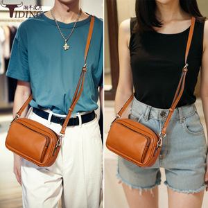 กระเป๋าหนังแท้สะพายข้าง สีน้ำตาลอ่อน สำหรับทุกเพศ พกพาสะดวก ทรงสี่เหลี่ยมแนวนอน ปิดด้วยซิป - Product Image 2