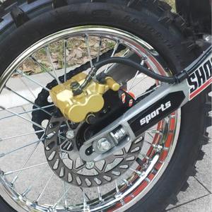 <span class=keywords><strong>Moto</strong></span> tout-terrain <span class=keywords><strong>110CC</strong></span> <span class=keywords><strong>4</strong></span> <span class=keywords><strong>temps</strong></span> pour adultes et adolescents, avec double embrayage et freins à disque hydrauliques, idéale pour le motocross et les sentiers. - Product Image 4