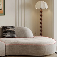 "Canapé de salon moderne en flanelle Chesterfield avec design incurvé et rembourrage en éponge"