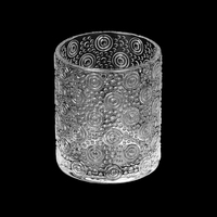 Porte-bougie en verre transparent avec motif floral en relief