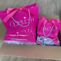 Sacs d'emballage en papier de chaussures noires de luxe en vente en gros de vêtements imprimés de logo personnalisé sac shopping de papier de vin de bijouterie de cadeau
