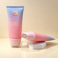 Tube cosmétique vide en PE avec impression de logo personnalisé, tête de massage en aluminium pour l'emballage de crème de soin corporel