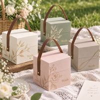 Tragegriff Goldfolie Botanische Kunstwerke OEM Papier Markengeschenkverpackung Rechteckige Deckel-und-Boden-Box