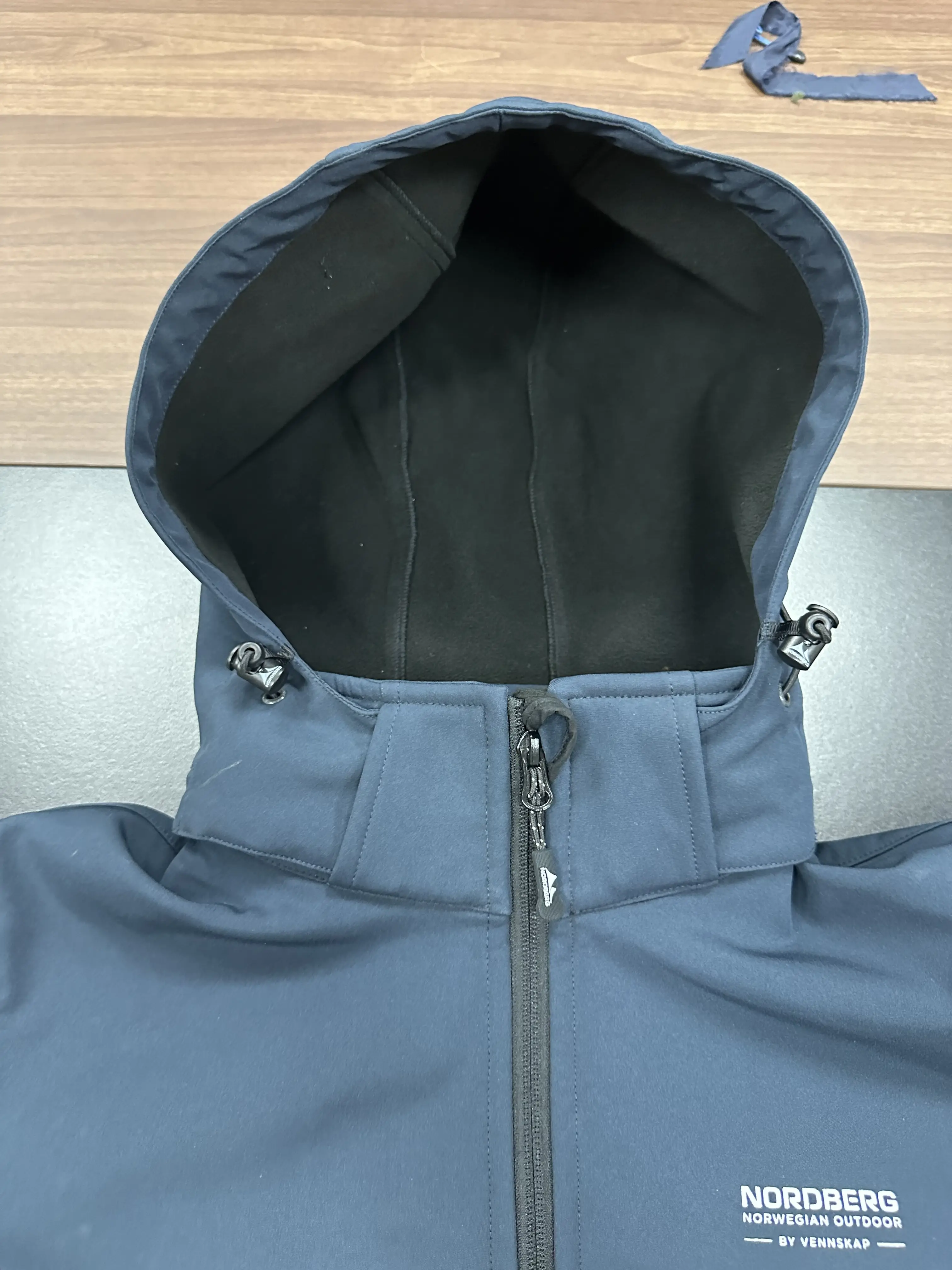 Standı yaka ve fermuar kapatma OEM hizmeti ile kış uzun uzunluk için özelleştirilebilir kapitone Softshell ceket
