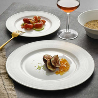 Assiette à steak en porcelaine fine haut de gamme, design côtelé, blanche, plate et peu profonde